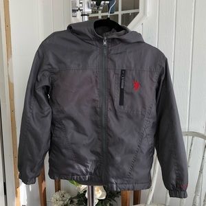 U.S. Polo Boy’s Reversible Nylon/Fleece Jacket.